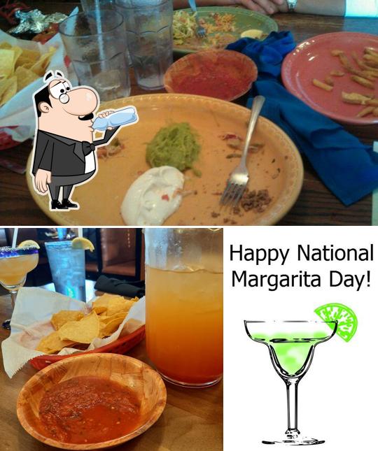 Take a look at the photo depicting drink and food at El Carreton Mexican Restaurant