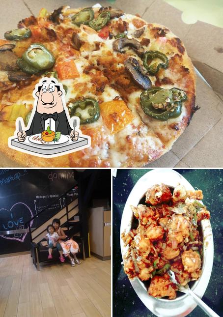 Parmi les diverses choses de la nourriture et la intérieur, une personne peut trouver sur Domino's Pizza