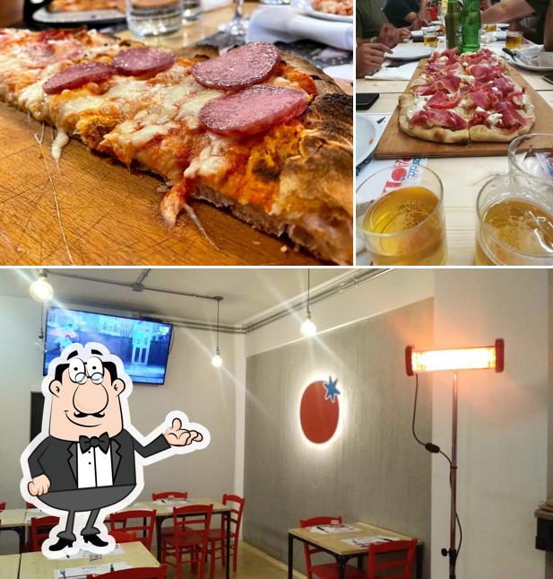 Installez-vous à l'une des tables de Pizzeria Paola Ancona