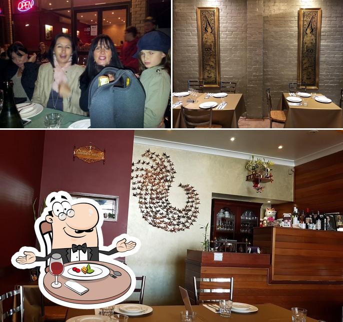 Las imágenes de comedor y barra de bar en La Thai