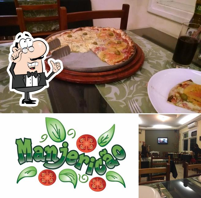Entre diferentes coisas, interior e pizza podem ser encontrados no Pizzaria Manjericão