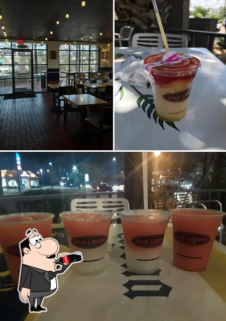 This is the image displaying drink and interior at Taco Cabana