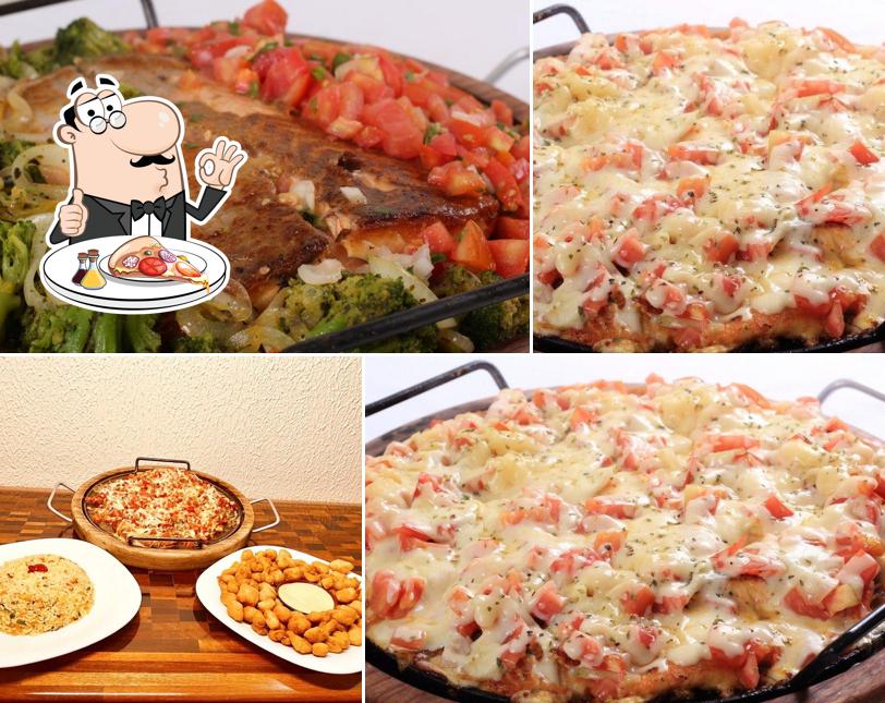Experimente pizza no Restaurante Pedrinho Peixes e Frutos do Mar