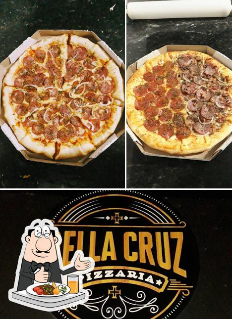 A imagem da comida e cerveja a Della Cruz Pizzaria