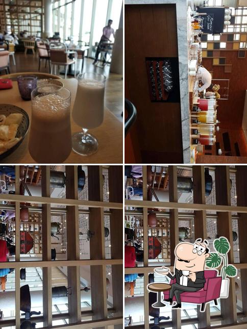 Take a seat at one of the tables at Malabar Cafe