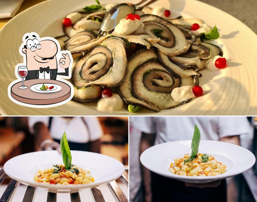 Cibo al L'Arcimboldo Ristorante con Pizza Centro Storico Giardino e Terrazza a Lago