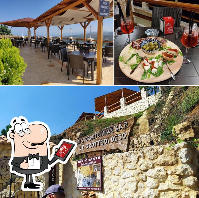 Curiosa tra l'area esterna di Ristorante Le Grotte di DeSo