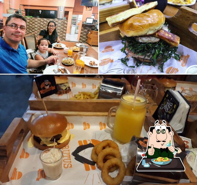 Confira a imagem apresentando comida e mesa de jantar no Restaurante Brutus