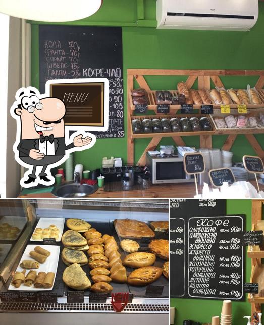 Это фотография, где изображены доска для меню и еда в Городской Хлеб
