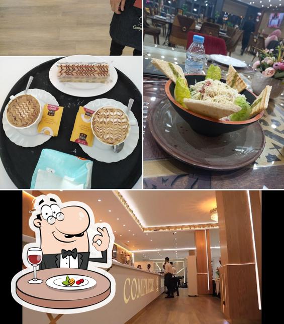 Check out the image depicting food and interior at complexe nakhil oujda