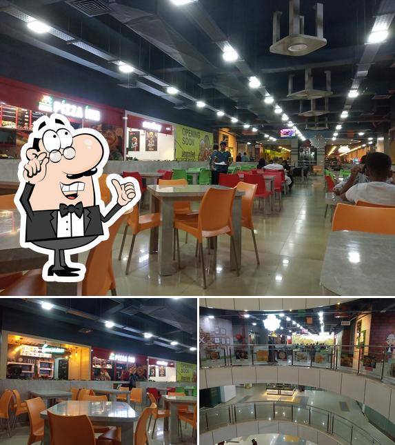 The photo of interior and exterior at Foodex Food Court Payyanur