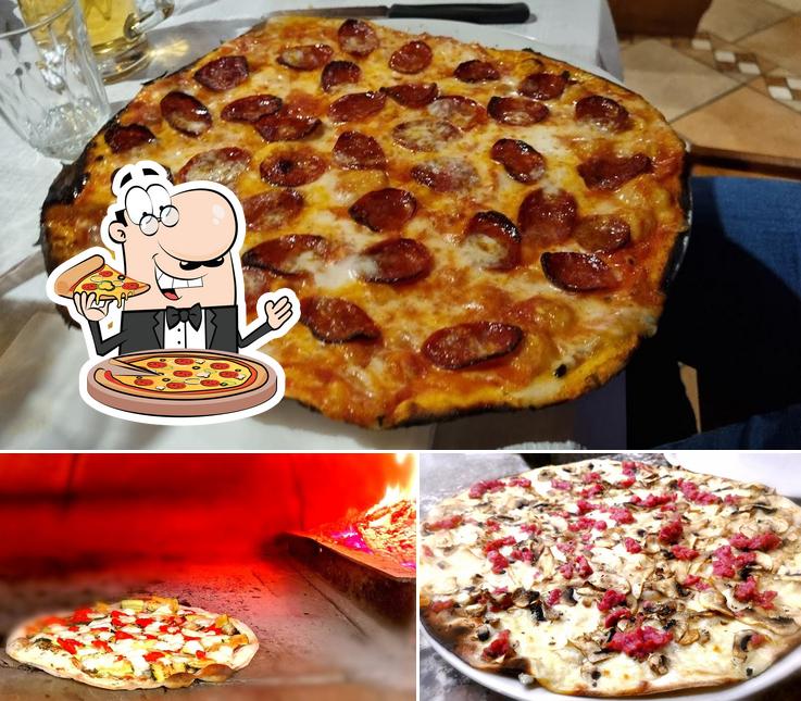 A Ristorante Pizzeria Podere Rosa, puoi goderti una bella pizza