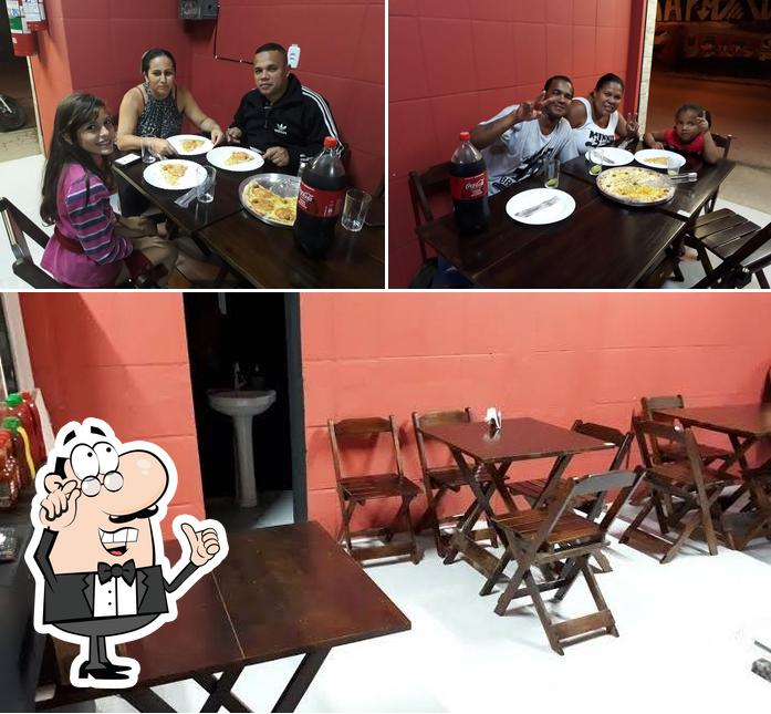 O interior do Forneria Steeve's Pizzaria