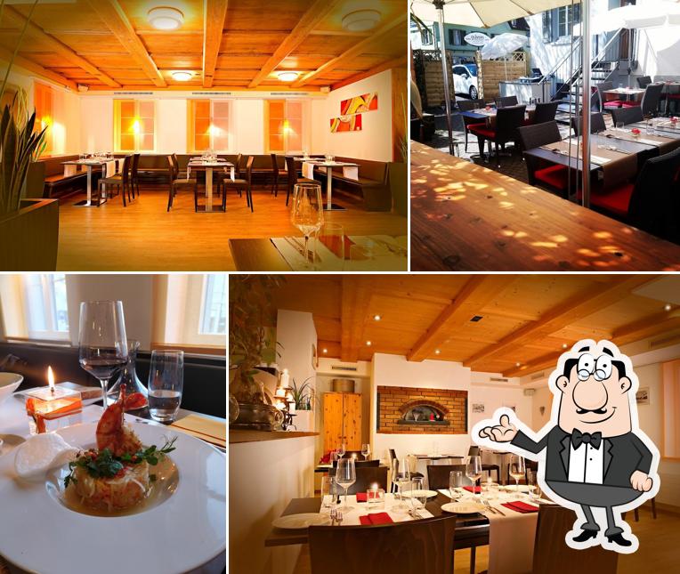 Dai un'occhiata agli interni di Olivers Restaurant