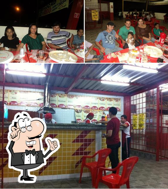 O interior do Fast Pizza