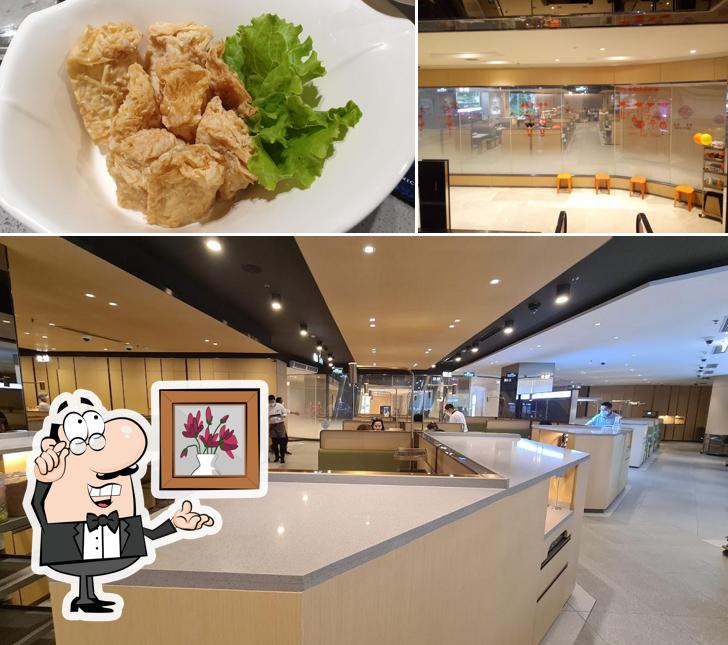 Take a look at the picture displaying interior and food at 海底捞火锅 Haidilao Hot Pot @Grand Indonesia