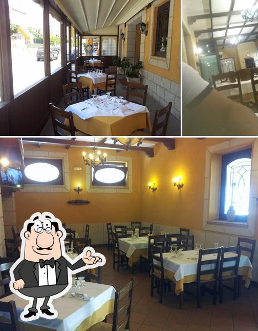 La foto della interni e tavolo da pranzo di Ristorante Pizzeria La Torreta