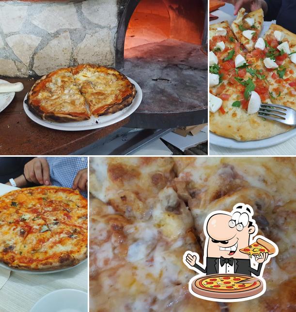 Essayez des pizzas à Pizzeria La Capannina Di Puglia Giuseppina