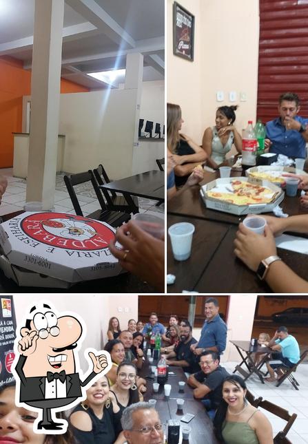 O interior do Pizzaria e Esfiharia Aldebarã Lorena