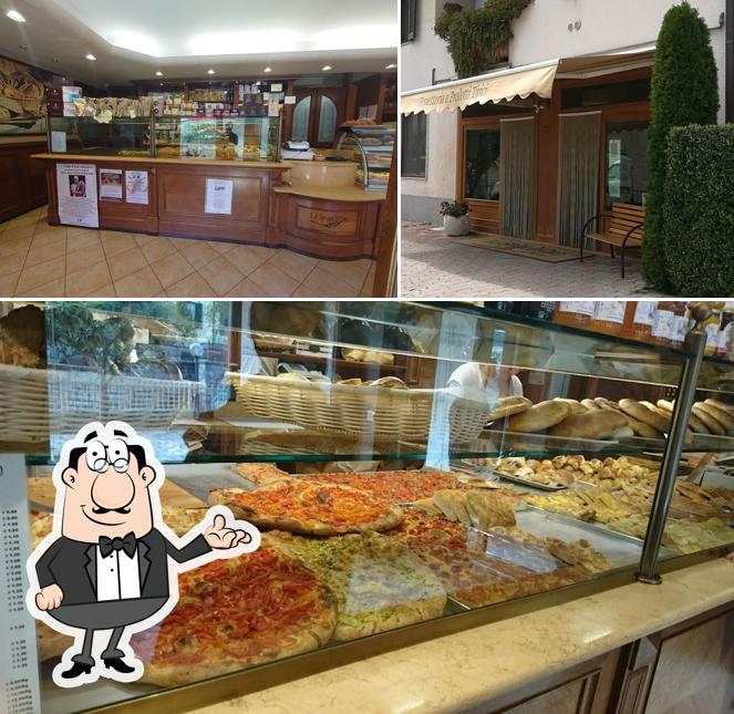 Parmi les différentes choses de la intérieur et la pizza, une personne peut trouver sur La Spiga D'Oro