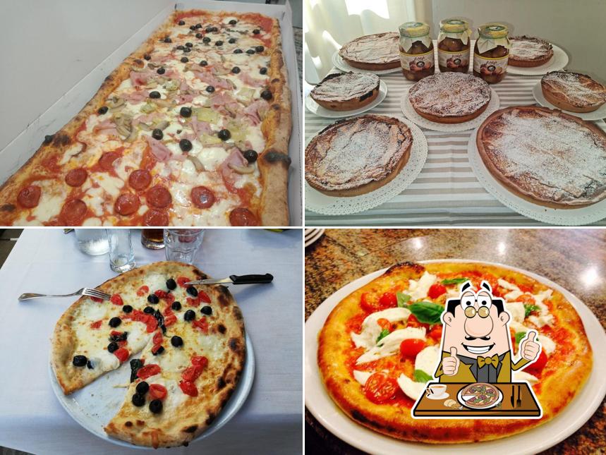 Попробуйте пиццу в "Nuova Pizzeria e Ristorante Capri"