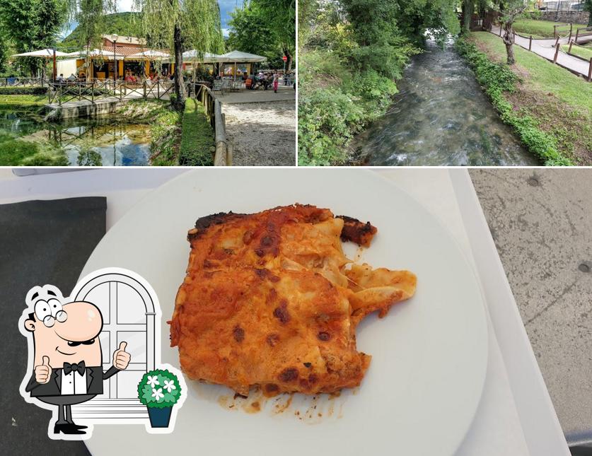 Dai un’occhiata alla foto che presenta la esterno e cibo di Il laghetto
