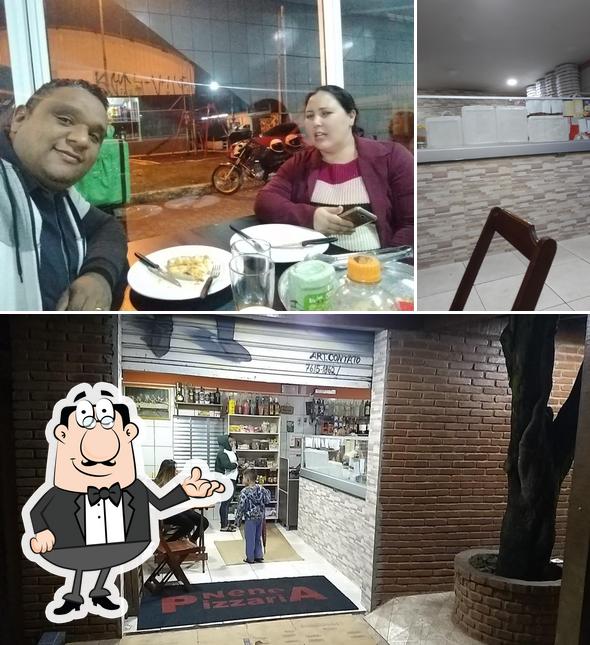 O interior do Nenê Pizzaria