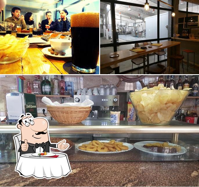 Check out the picture showing dining table and food at Bar Cervecería Barco
