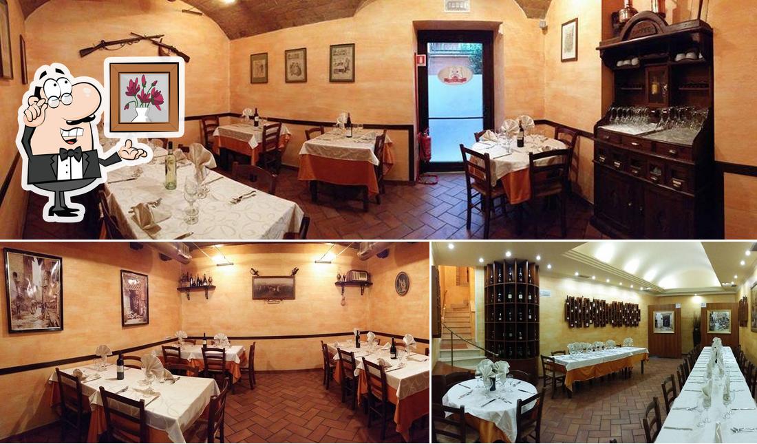 Check out the image displaying interior and dining table at Locanda Don Vincenzo