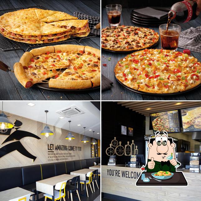 Voici l’image représentant la nourriture et intérieur sur Debonairs Pizza