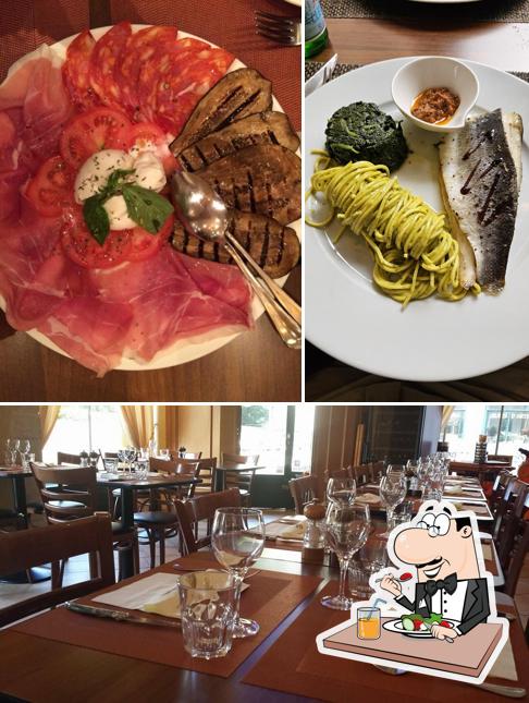 Dai un’occhiata alla foto che raffigura la cibo e tavolo da pranzo di Colosseo