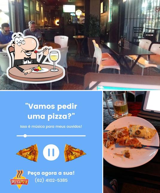 Entre diferentes coisas, comida e interior podem ser encontrados no Pizza pick