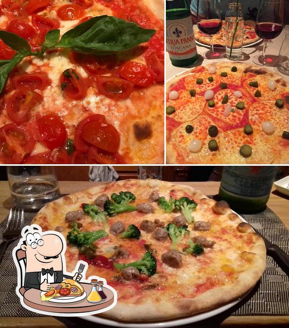 Scegli una pizza a Restaurant Vieux-Valais da Nico
