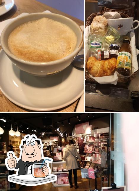 Voici la photo représentant la boire et intérieur sur Tchibo shop with coffee bar