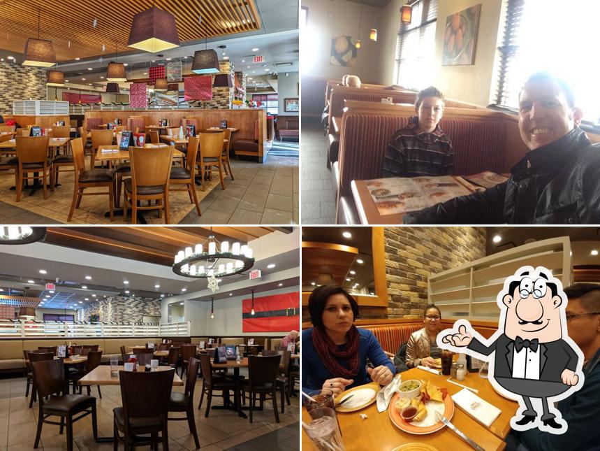 Take a seat at one of the tables at Swiss Chalet