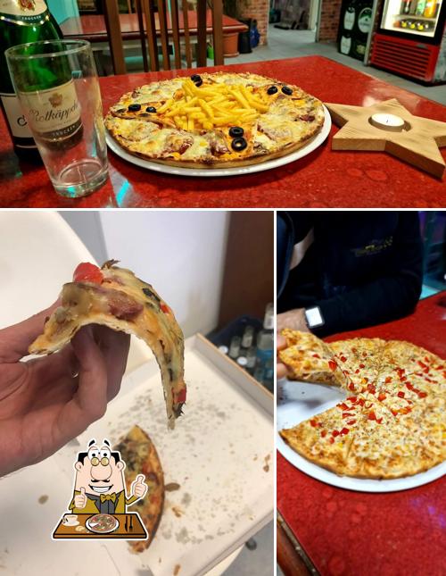 Prenez des pizzas à Pizzeria Disni-Pizza