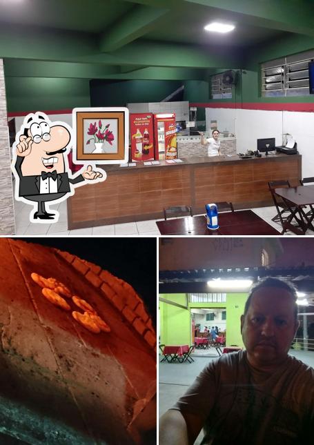 A Pizzaria La Famiglia Bela Vista se destaca pelo interior e comida