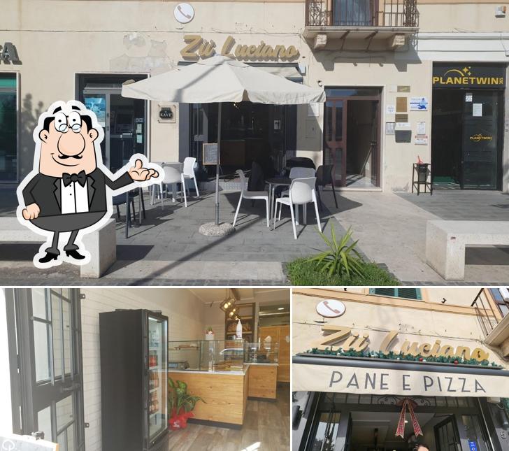 Dai un'occhiata agli interni di Pizzeria zi luciano