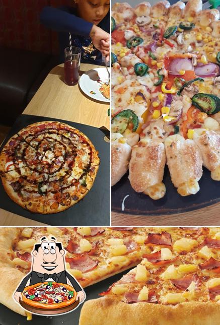 Try out pizza at Pizza Hut Restaurants