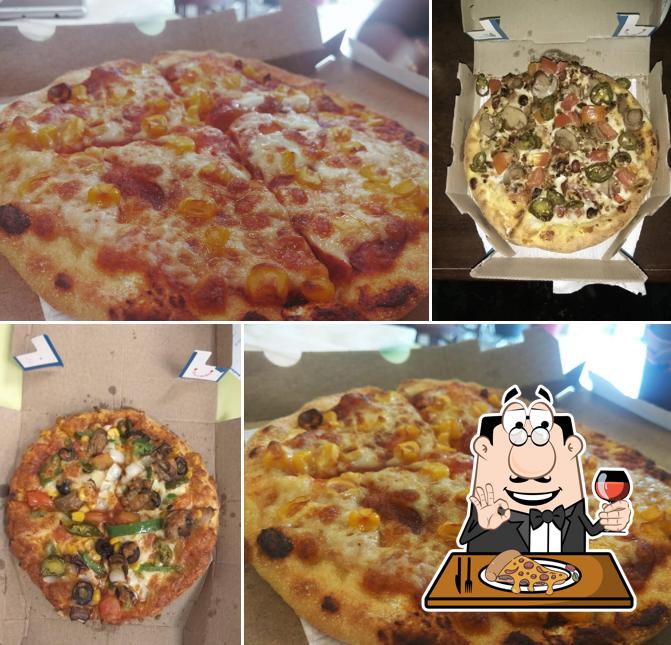 В "Domino's Pizza - Cork - Douglas Village" вы можете попробовать пиццу