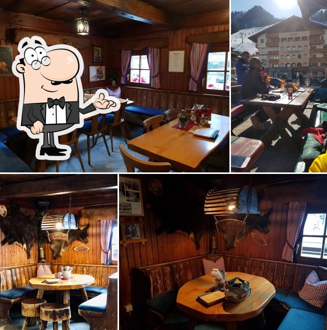 This is the photo displaying interior and food at Felserhütte Zauchensee