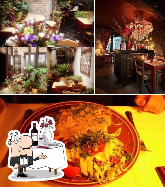 Столики и еда - все это можно увидеть на этом фото из De Vlaamsche Pot