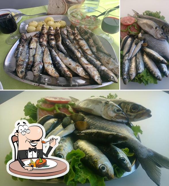 "Lâmpada Restaurante/Snack-Bar" предлагает блюда для любителей рыбы