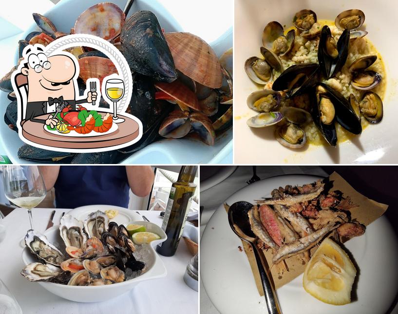 Закажите блюда с морепродуктами в "Onda Blu Isola"