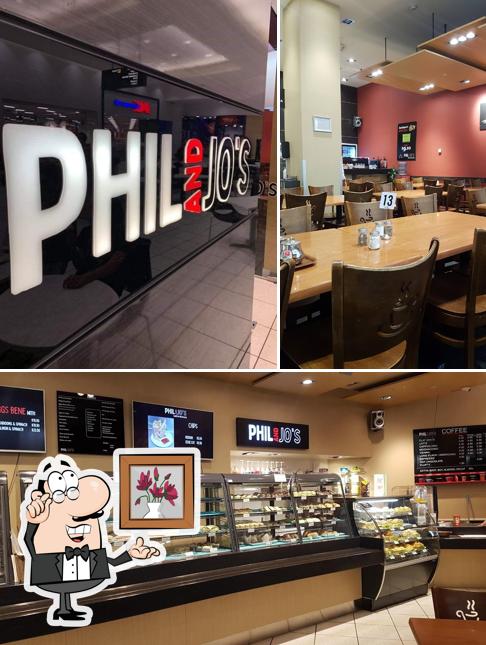 The photo of interior and food at Phil and Jo's Cafe
