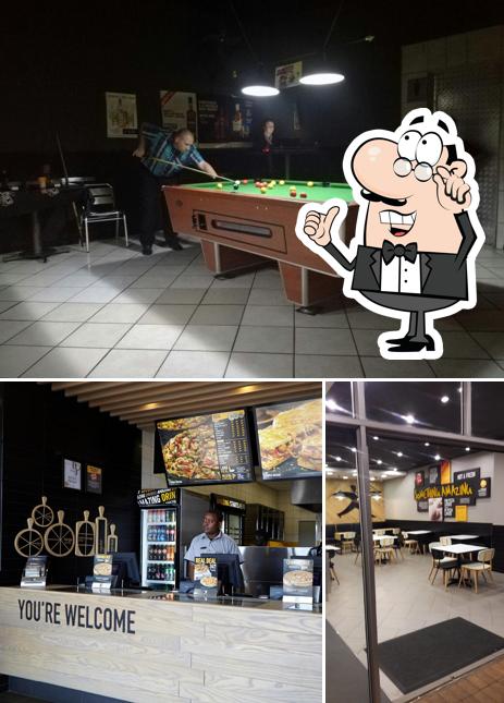 L'intérieur de Debonairs Pizza