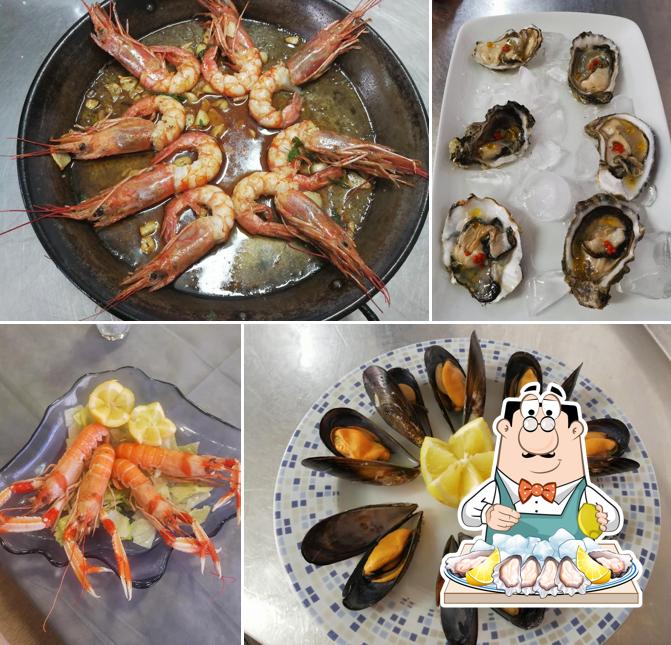 Order various seafood meals served at Restaurante el Paso