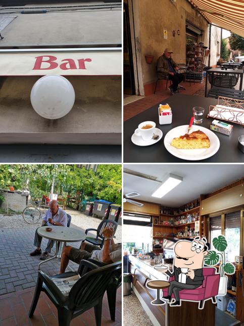 Guarda la foto che presenta la interni e cibo di Bar Cacciatori