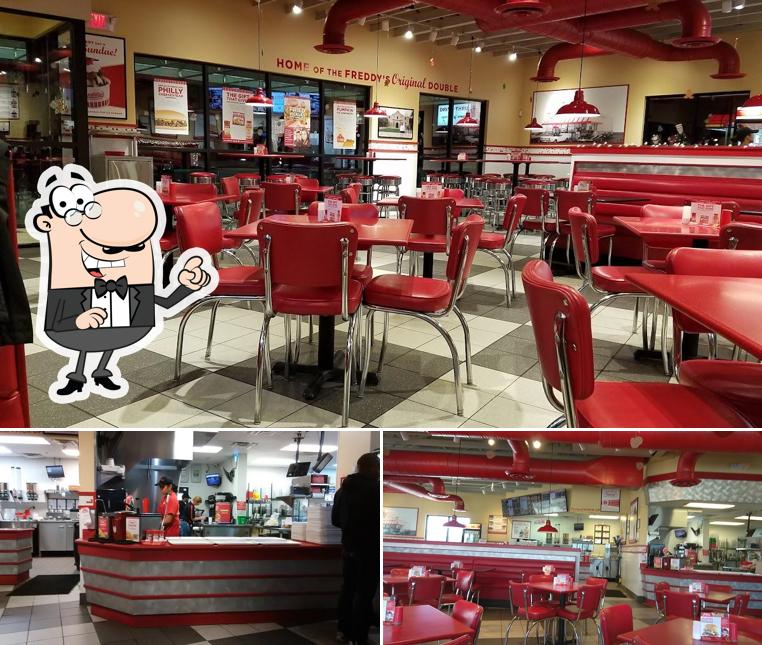 Take a seat at one of the tables at Freddy's Frozen Custard & Steakburgers