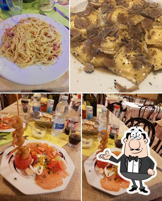 Questa è la immagine che presenta la interni e cibo di Trattoria da Igor